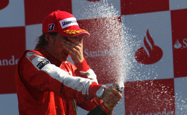 Italian Grand Prix 2009: Kimi Raikkonen of Finland and Ferrari celebrates after finishing third