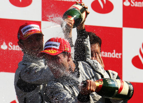 Italian Grand Prix 2009: Rubens Barrichello, right, of Brawn GP celebrates with  Jenson Button