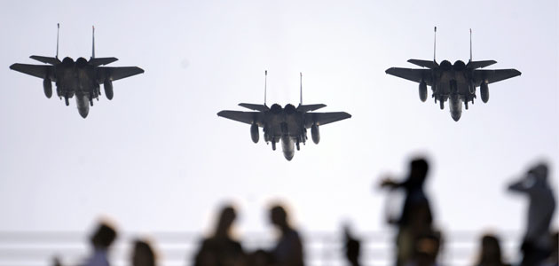 24 hours in pictures: New York City, US: Three F-15 military jets fly over Arthur Ashe Stadium