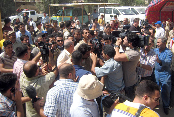 al Zaidi released: Muntazer al-Zaidi surrounded by the press