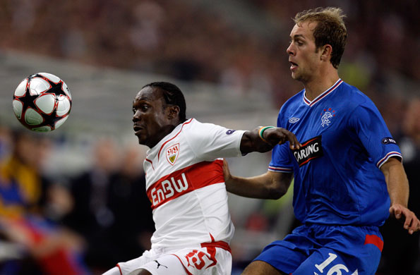 1 wed champions league: VfB Stuttgart's Arthur Boka shields the ball from Rangers' Steven Whittaker