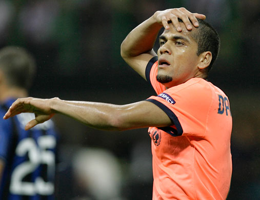 2 wed champions league: Barcelona defender Daniel Alves reacts after missing a chance to score 