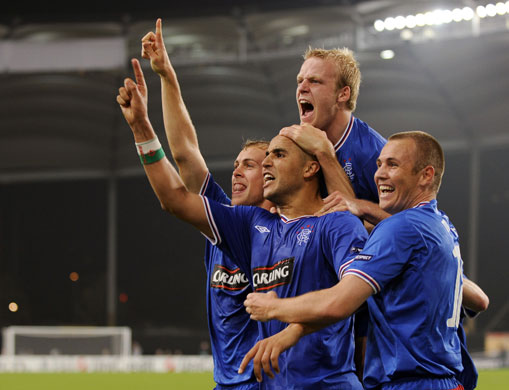 3 wed champions league: Madjid Bougherra celebrates with team mates 