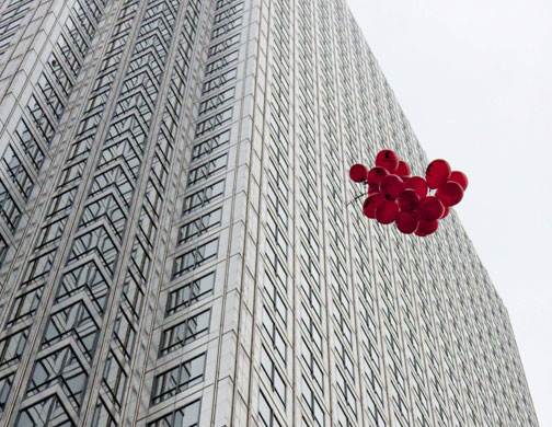 Week in Business: Red balloons are released outside the Financial Services Authority offices