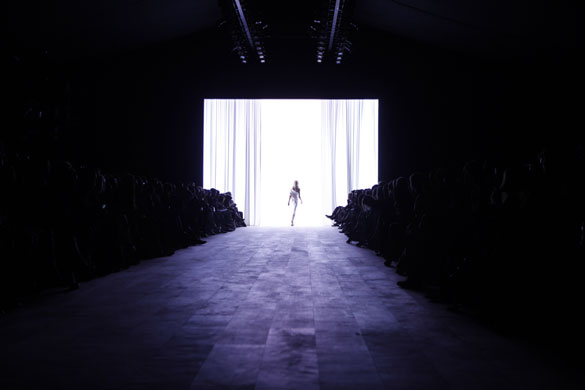 24 hours in pictures: A model wears spring 2010 Tommy Hilfiger during New York Fashion Week