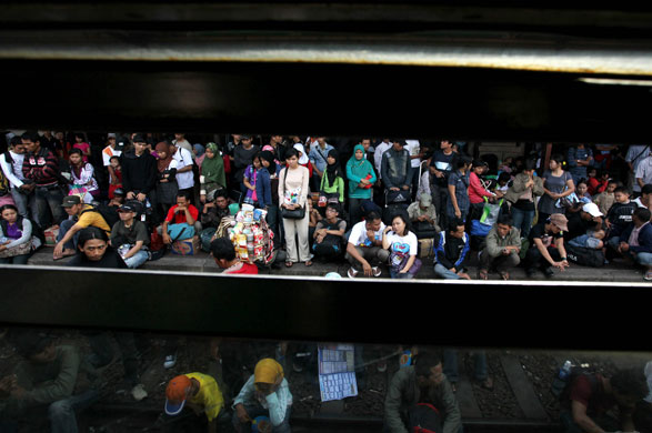 24 hours in pictures: Indonesians Travel Home For Eid ul-Fitr Celebrations