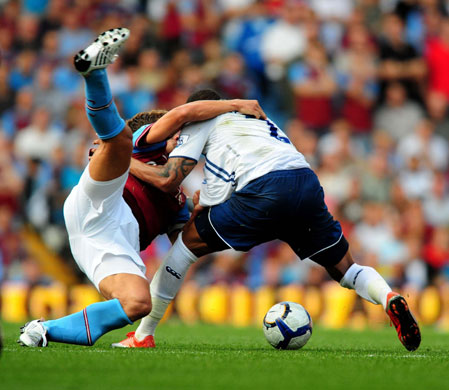 Saturday Premiership : Aston Villa's Stiliyan Petrov grapples with Pompey's Kevin Prince Boateng
