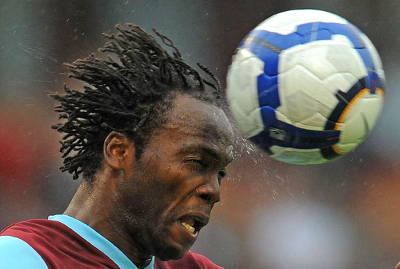 Saturday Premiership : Burnley defender Andre Bikey heads the ball