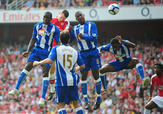 Saturday Premiership : Arsenal's Thomas Vermaelen rises above the Wigan defence to score
