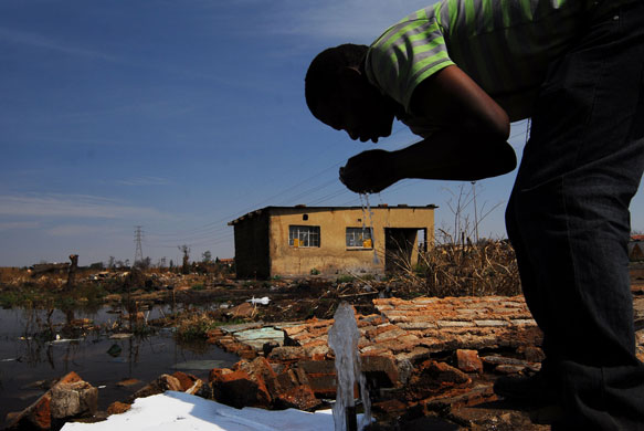 Chiawelo in Soweto: Moses Malinga uses the community's only access to drinking water