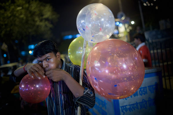 24 hours in pictures: Indian Muslims Gather On The Last Days Of Ramadan