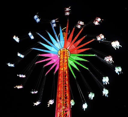 21 September 2009: Munich, Germany: Visitors enjoy late night rides