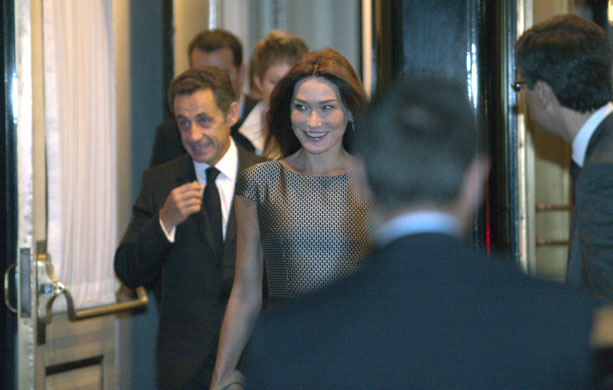 United Nations summit: Nicolas Sakozy and Carla Bruni-Sarkozy leave their hotel in New York