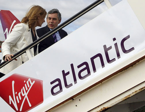 UN Summit: Gordon Brown and his wife Sarah board an aircraft