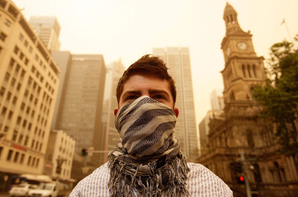 Sydney dust storm: A man wearing a scarf as a mask
