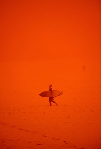 Sydney dust storm: A surfer at Bondi Beach