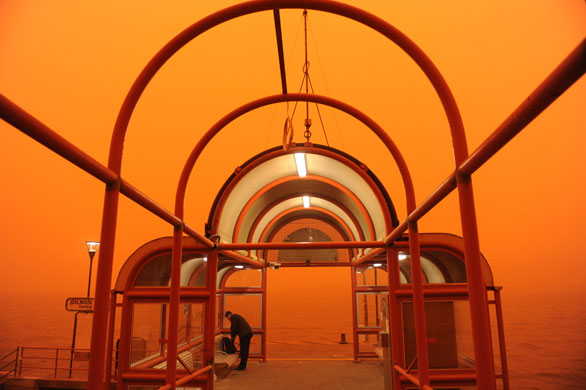 Sydney dust storm: A Man Prepares To Leave A Ferry Wharf In Balmain