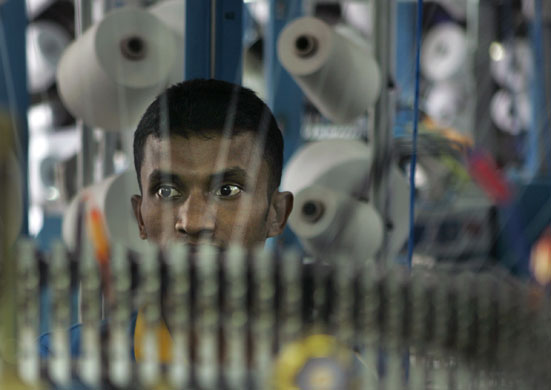 23 September 2009: Maharagama, Sri Lanka: A worker in a garment factory