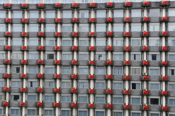 24 hours in pictures: Chinese national flags are hung for 60th anniversary 