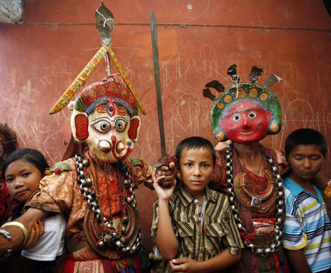 24 hours in pictures: Mediums dressed as deities are seen during a trance in Nepal