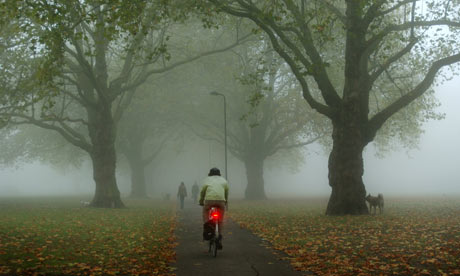 Bike blog: Cyclist commuting by a Foggy Morning In A Park In Hackney, London