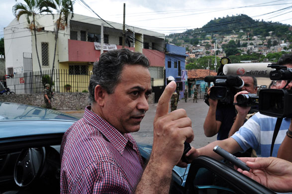 Honduras crisis: Brazilian Embassy staff member Jose Wilson speaks to the press