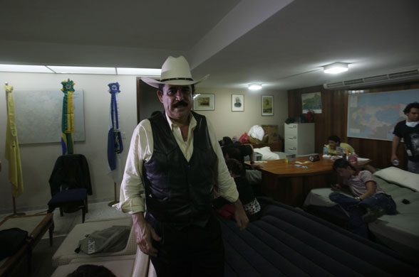 Honduras crisis:  Honduras' ousted President Manuel Zelaya inside the Brazilian embassy