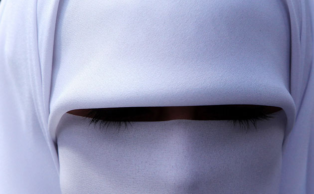 29 September 2009: Amman, Jordan: A veiled woman