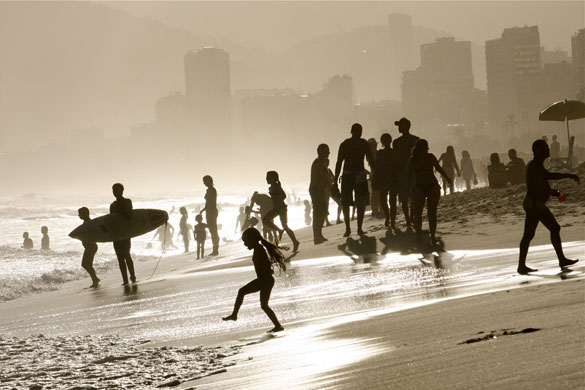 29 September 2009: Rio de Janeiro, Brazil: People relax at Copacabana beach