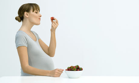 Pregnant woman eating str 001