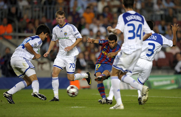 Tuesday3 Champions League: Pedro Rodriguez slots his shot through a crowd of Kiev defenders and scores