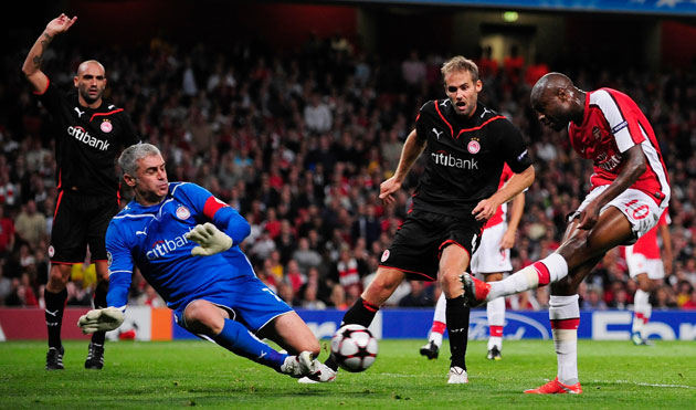 Tuesday3 Champions League: William Gallas of Arsenal has his shot blocked by Antonis Nikopolidis