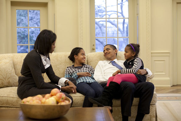 The Obama family: 2 February 2009: President Barack Obama on a sofa in the Oval Office