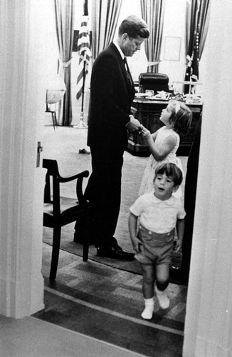 The Obama family: October 1963: John F Kennedy with his children Caroline and John Jnr