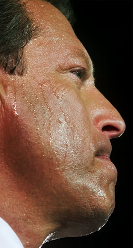 Sweating politicians: Al Gore addresses an audience at Martin Luther King High School