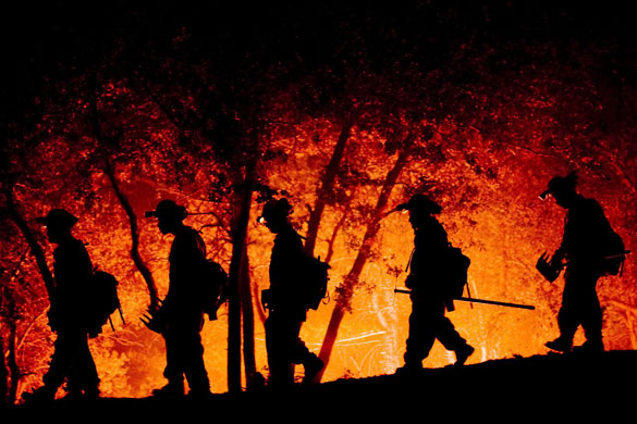 3 September 2009: San Gabriel Canyon, US: Fire crews work to contain the Station fire