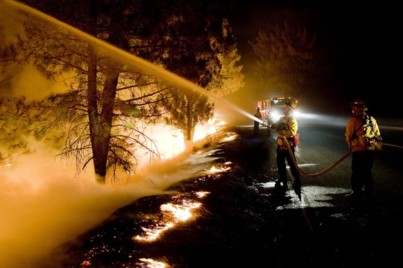 Wildfires in California: Fire crews work to contain the Station fire in the San Gabriel Canyon