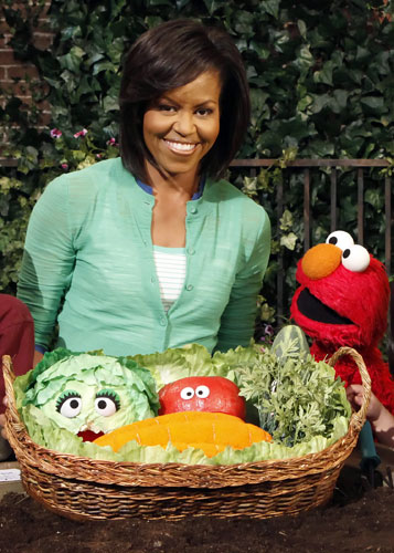 Wacky leader partners: Michelle Obama meets Elmo on the set of Sesame Street