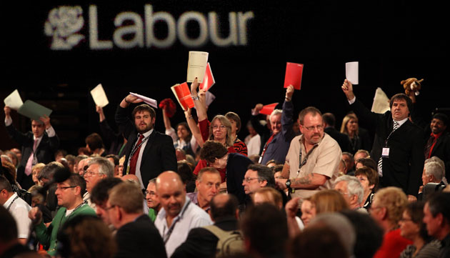 Labour conference day 4: Delegates wave papers to indicate their wish to address the Conference