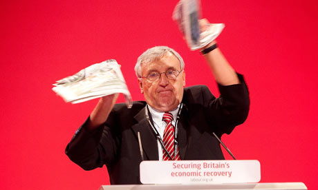 Tony Woodley tears up a copy of The Sun newspaper at the Labour Party Conference.