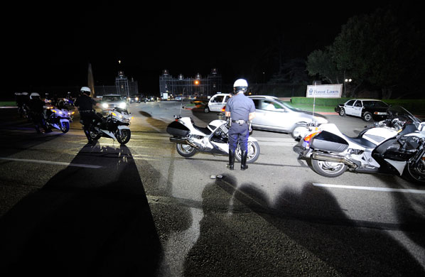Michael Jackson funeral: The Glendale Police Department motorcycle motorcade infront of the cemetery