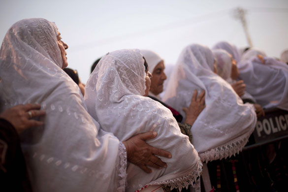 4 September 2009: Palestinian women stand in line