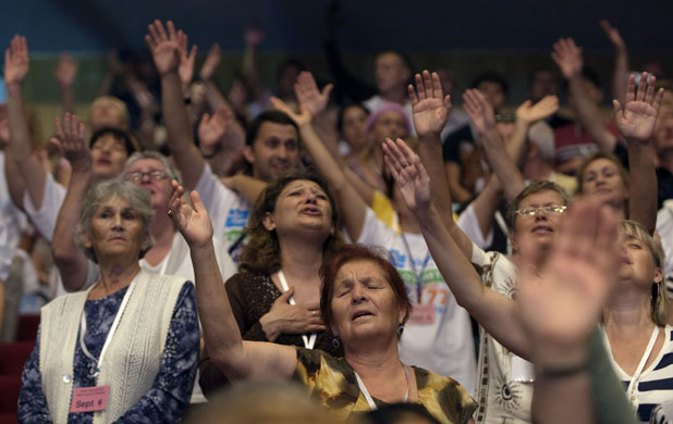 7 September 2009: Jerusalem: Christian worshippers pray during a evangelical rally