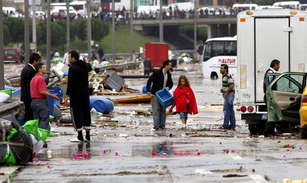 Flooding in Turkey: People walk through a flooded main highway connection road in Istanbul