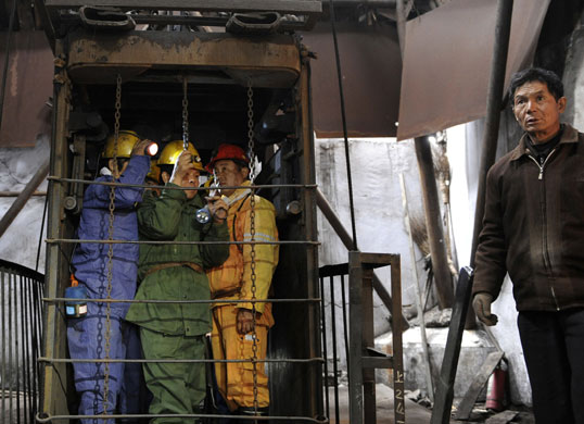 9 September 2009: Pingdingshan, China: Rescue workers enter the Xinhua No. 4 coal mine