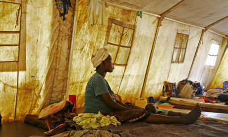 Woman with child in Ghana, for Guardian Weekly