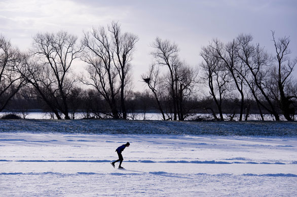 Fen skating: A competitor gets in some early morning practice before the crowds turn up