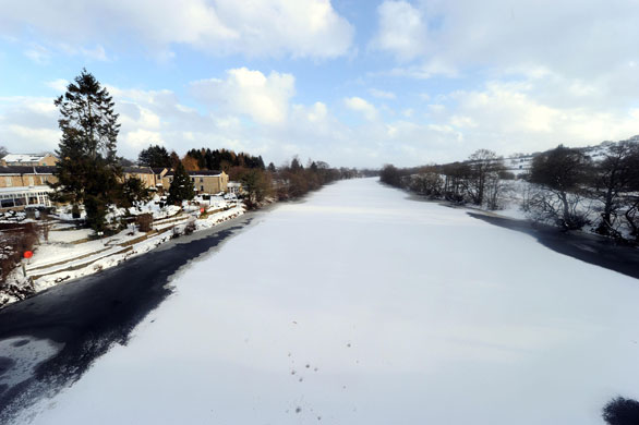 snow update: The River Tyne in Chollerford, Hexham, Northumberland, remains frozen