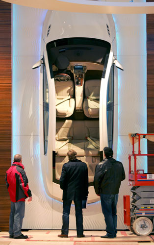 Detroit motor show: Exhibit designers inspect the 2010 Buick LaCrosse