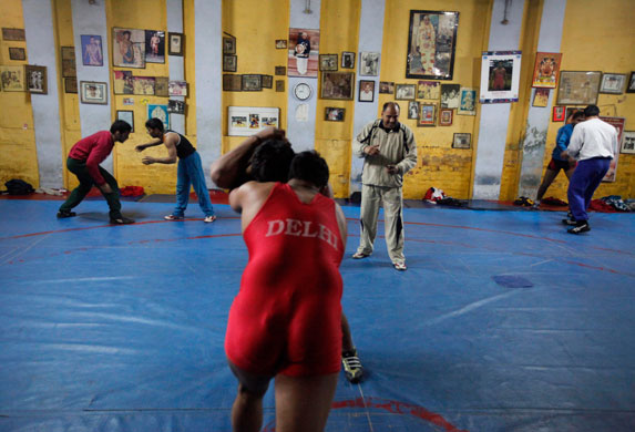 wrestling: Wrestlers train at a gymnasium in New Delhi